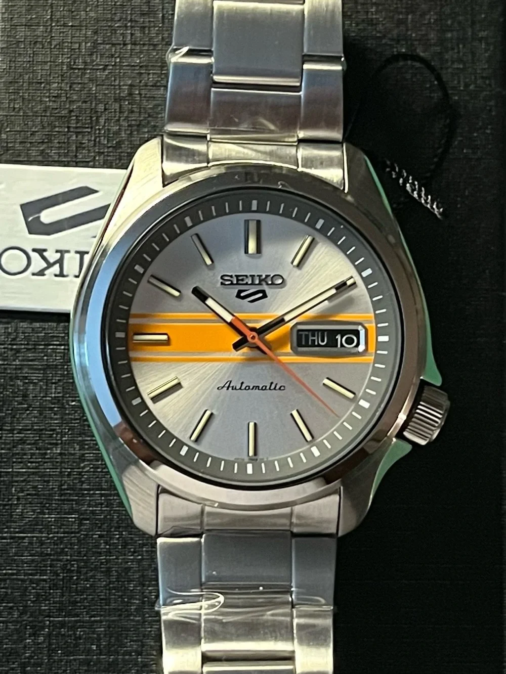 Seiko : RETRO GT Silver Watch with Orange Stripe and Orange Seconds Hand SRPE51